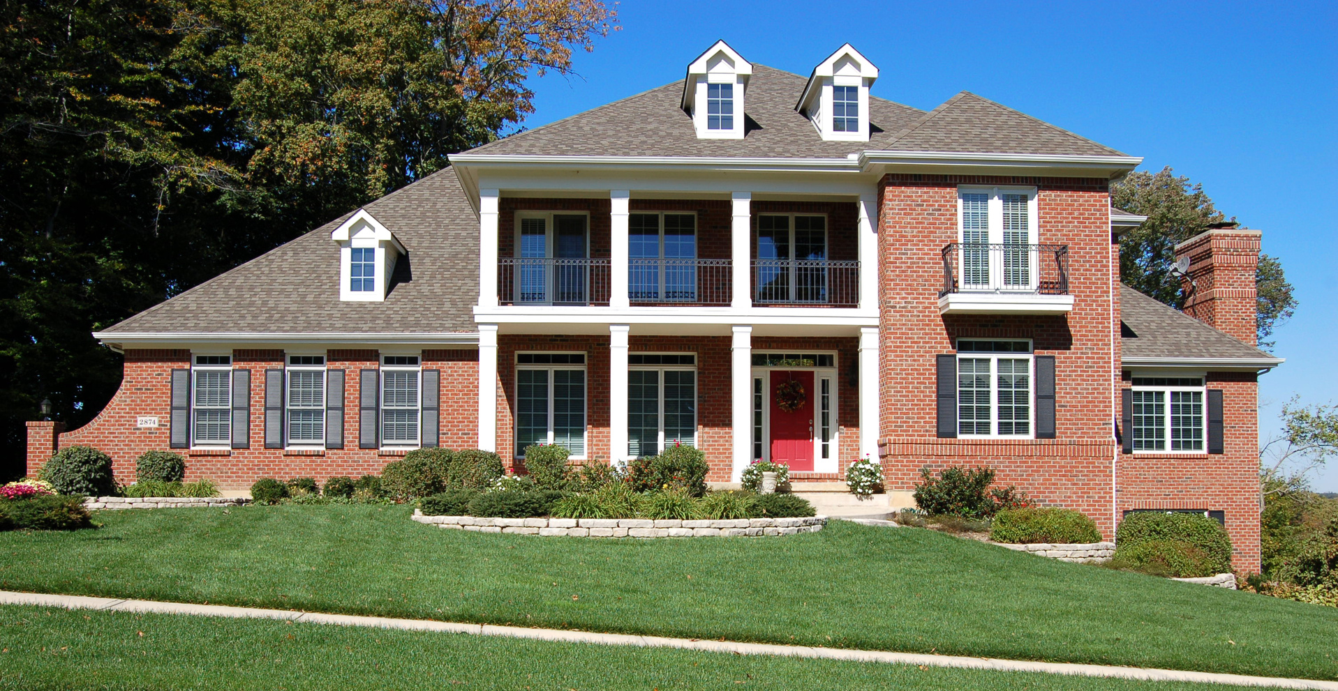 Beautiful residential home with roof installed by Republic Roofing in St. Louis